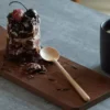 Round solid wood spoon with long handle in black walnut, cherry wood, or hard maple