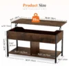 Two open shelves under a lift top coffee table storing remotes and books