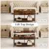 Black lift top coffee table with two open shelves holding books and blankets