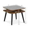 Faux marble end table in walnut finish used as a bedroom nightstand