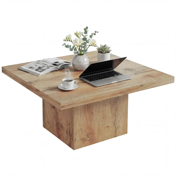 Square wood coffee table with light brown wood-grain top in a minimalist living room