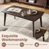 Close-up of the smooth curved edge and walnut grain finish on the coffee table