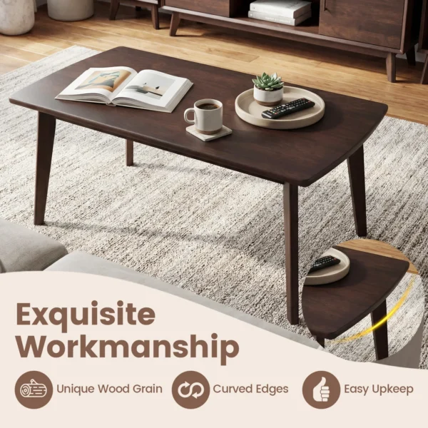 Close-up of the smooth curved edge and walnut grain finish on the coffee table