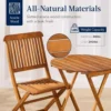 Acacia wood patio set for two on a small deck with a plant in the corner