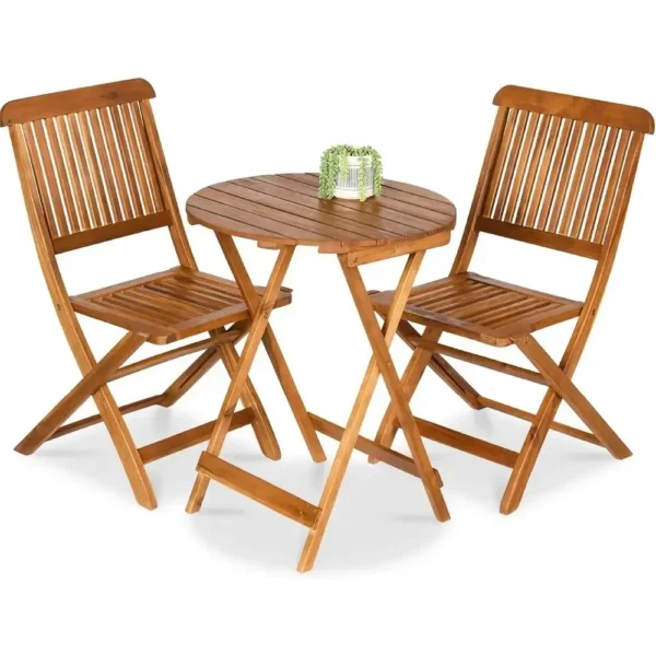 Three-piece acacia wood patio set with two chairs and a round table on a balcony