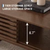 mid-century-modern-coffee-table-storage-living-room-4 Interior storage compartment of the coffee table holding books and magazines