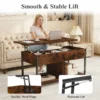 Lift top coffee table used as a desk with a laptop on the raised surface
