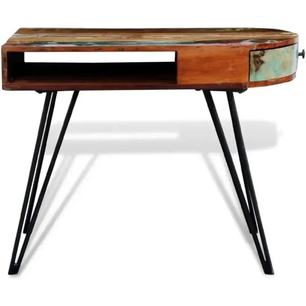 Handcrafted waxed wood desk in brown industrial style placed in a small space