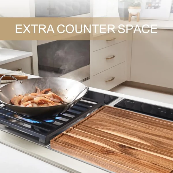 Butcher block cutting board used for chopping vegetables on a kitchen counter
