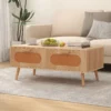 wooden-coffee-table-with-storage-rattan-2 Front view of the natural rattan coffee table showing both hand-woven drawer fronts and wooden handles