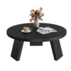 Round coffee table for small living room with black wood-grain top and three-leg base