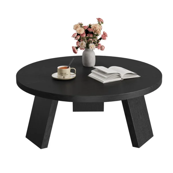 Round coffee table for small living room with black wood-grain top and three-leg base